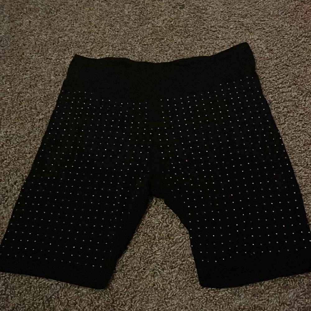 high-waisted black spandex biker shorts with rhinestone design (front and back)